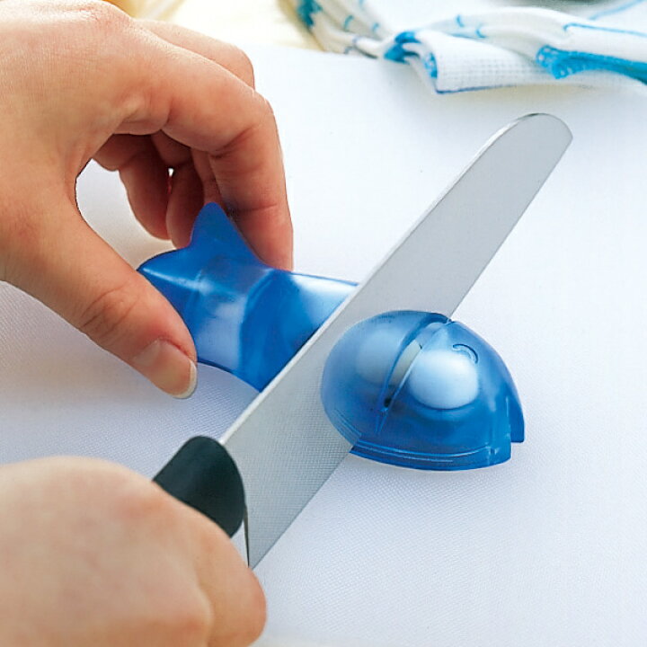 Magnetic Marna fish sharpener stored neatly on a metal kitchen surface