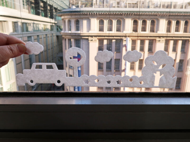 KOKUBO Townscape condensation sheet fitted along the bottom of a window