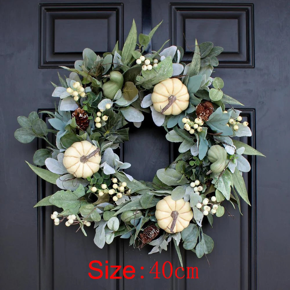 white pumpkin autumn wreath with foliage and berries