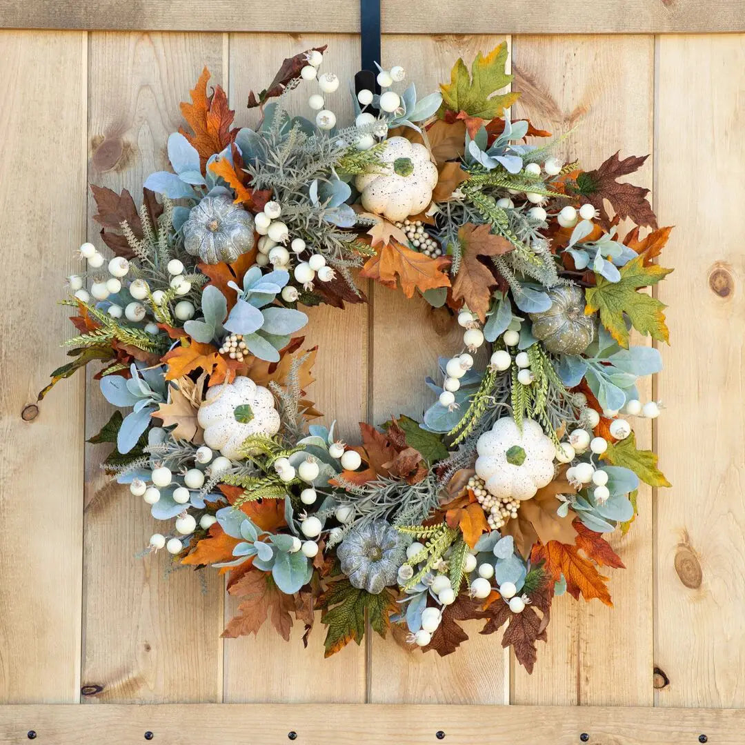 white pumpkin autumn wreath with foliage and berries