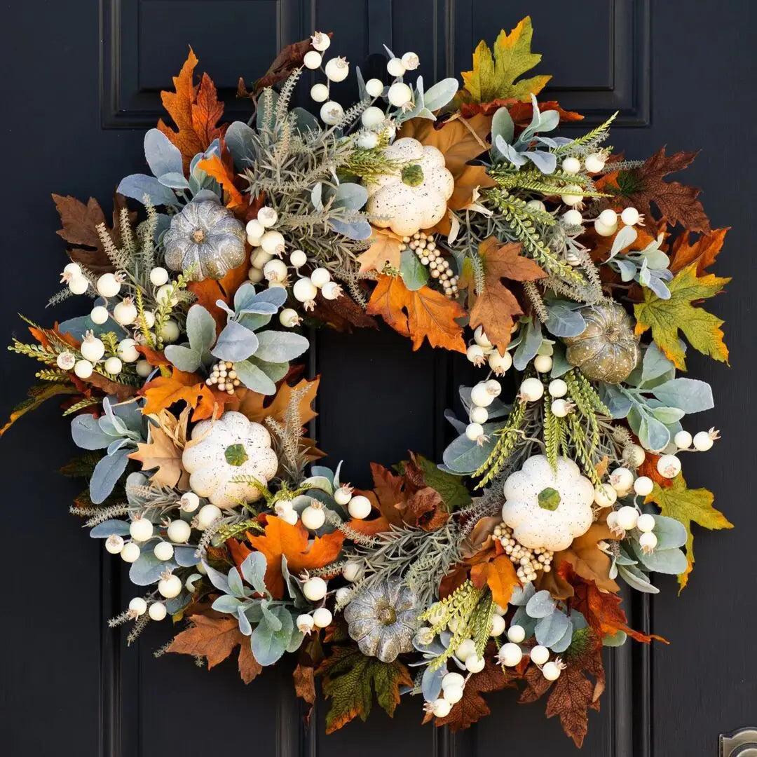 white pumpkin autumn wreath with foliage and berries