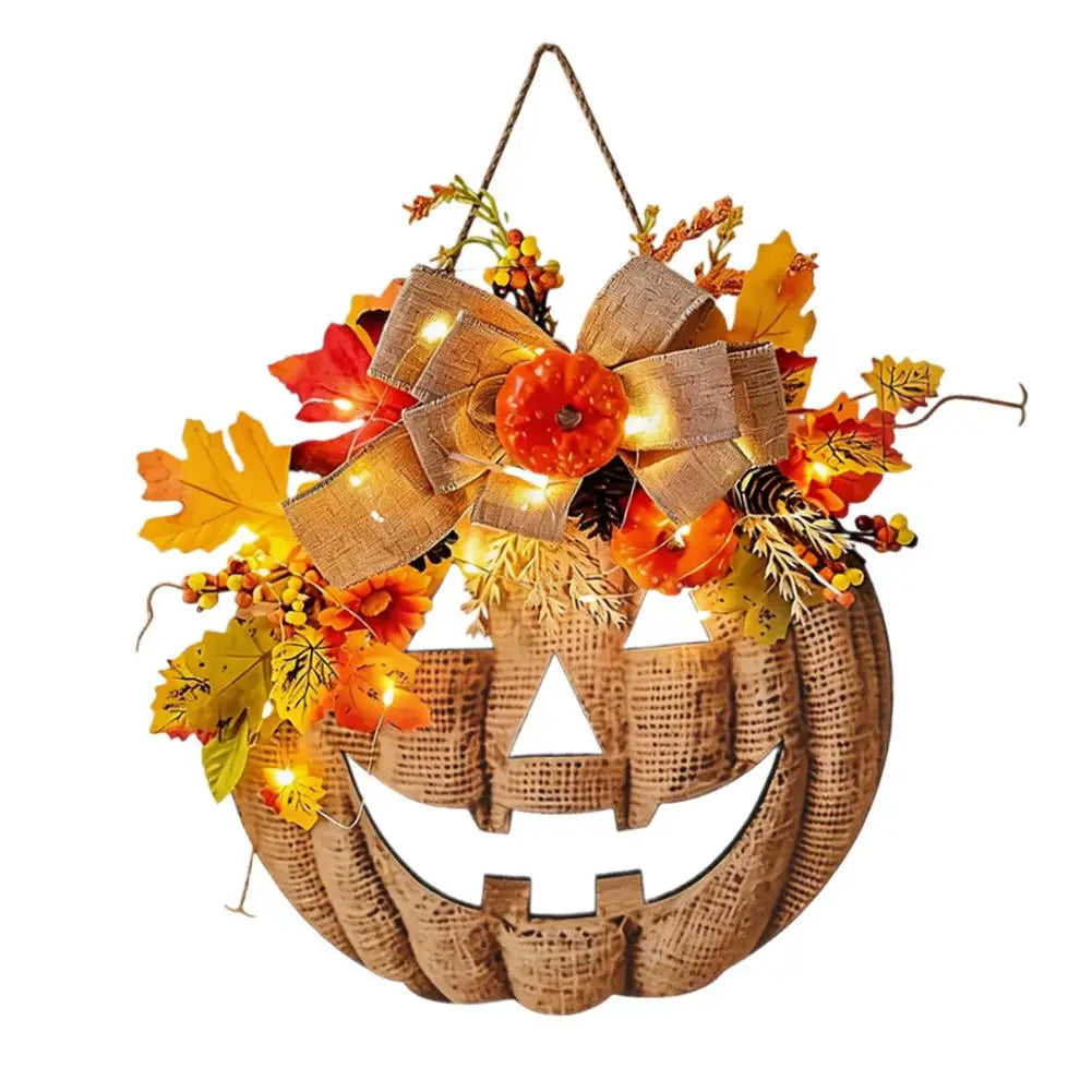 light up autumn pumpkin door hanger with maple leaves and bow