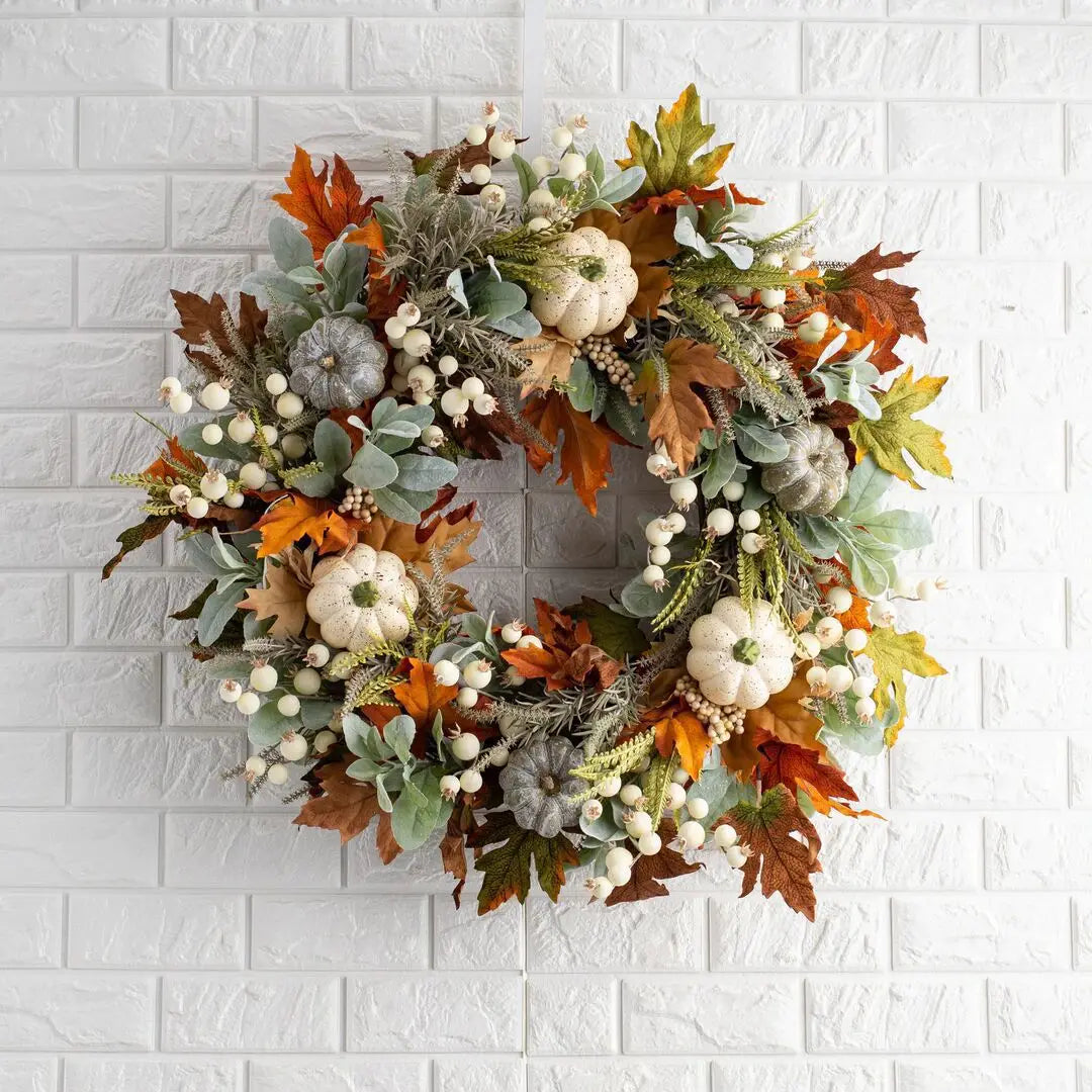 white pumpkin autumn wreath with foliage and berries